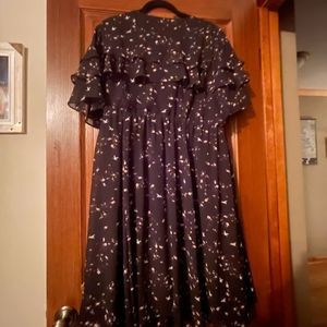 Torrid Black Asymmetrical Dress with White Floral Pattern